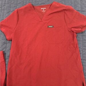 JAANUU Women’s Rhena Slim Essential 1-Pocket Scrub Top- Burgandy